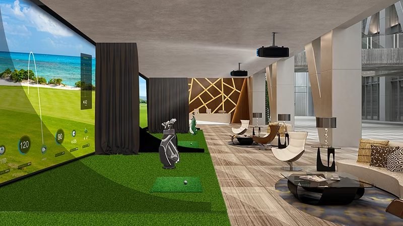 Indoor golf simulator lounge with a projected course and putting green